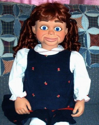 photo of Meg O'Ryan as a ventriloquists' dummy.
