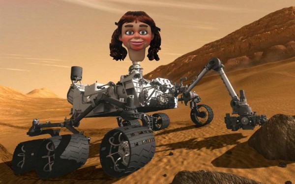 Ventriloquist dummy head on the arm of a mars rover 