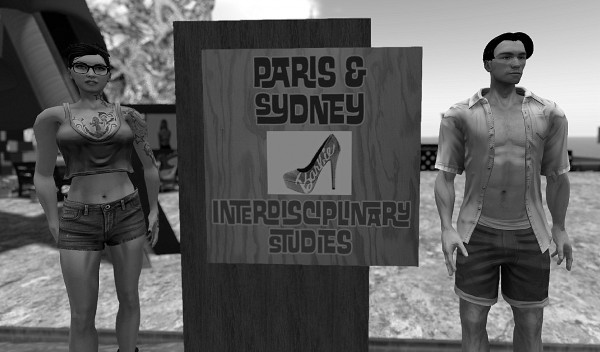 Sydney Avatar & Paris Avatar standing on either side of their studio door card at Medici Unviersity at LEA23 in Second Life.